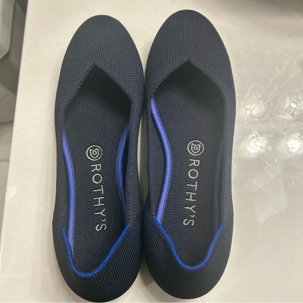 Like new Rothy’s The Flat in navy blue!